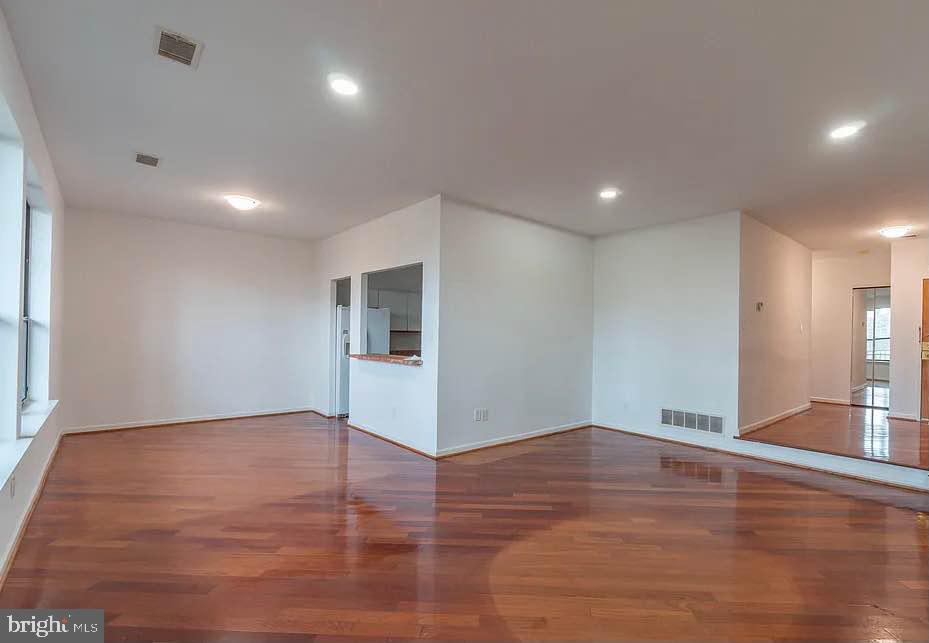 301 Byberry Road, Unit F7 Philadelphia, PA 19116 - Photo 4 of 19 a view of empty room with wooden floor