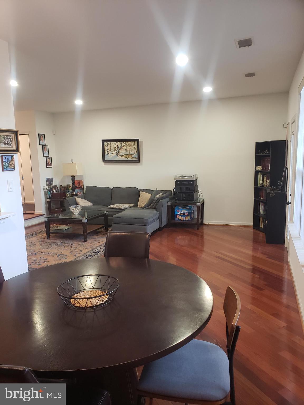 301 Byberry Road, Unit F7 Philadelphia, PA 19116 - Photo 5 of 19 a living room with furniture and a flat screen tv