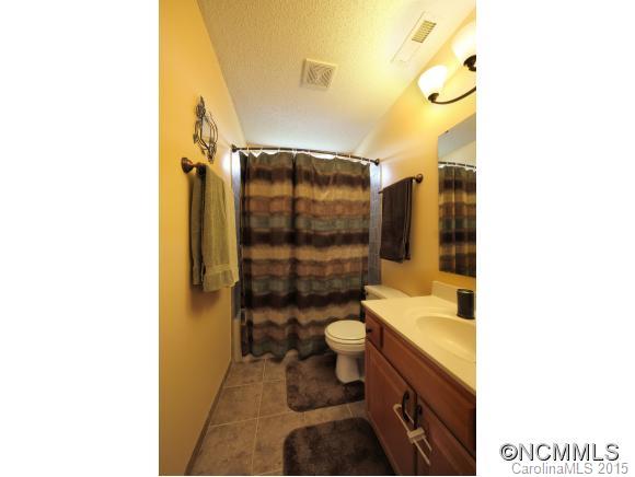 55 English Oak Road Fletcher, NC 28732 - Photo 11 of 17 a bathroom with a sink toilet and shower