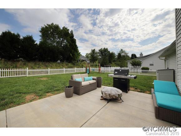 55 English Oak Road Fletcher, NC 28732 - Photo 12 of 17 a view of a patio with couches chairs and a yard