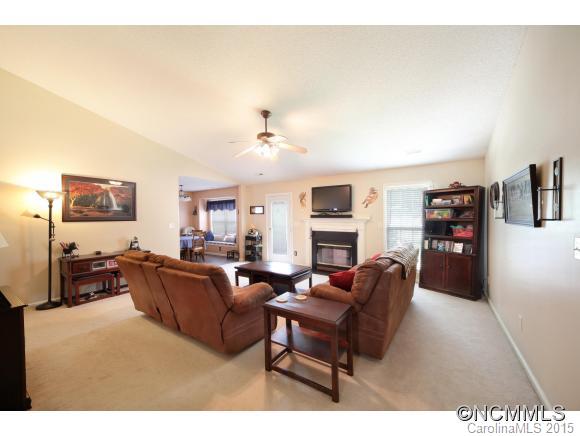 55 English Oak Road Fletcher, NC 28732 - Photo 3 of 17 a living room with furniture and a flat screen tv