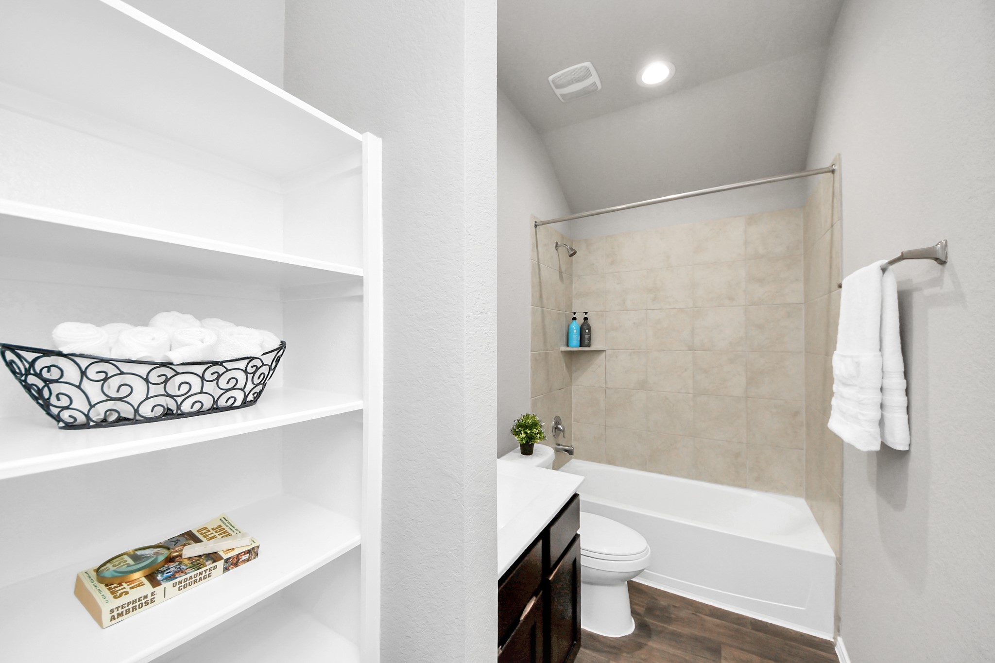 22906 Modica Rift Lane Katy, TX 77449 - Photo 18 of 27 a bathroom with a bathtub a sink a toilet and shower