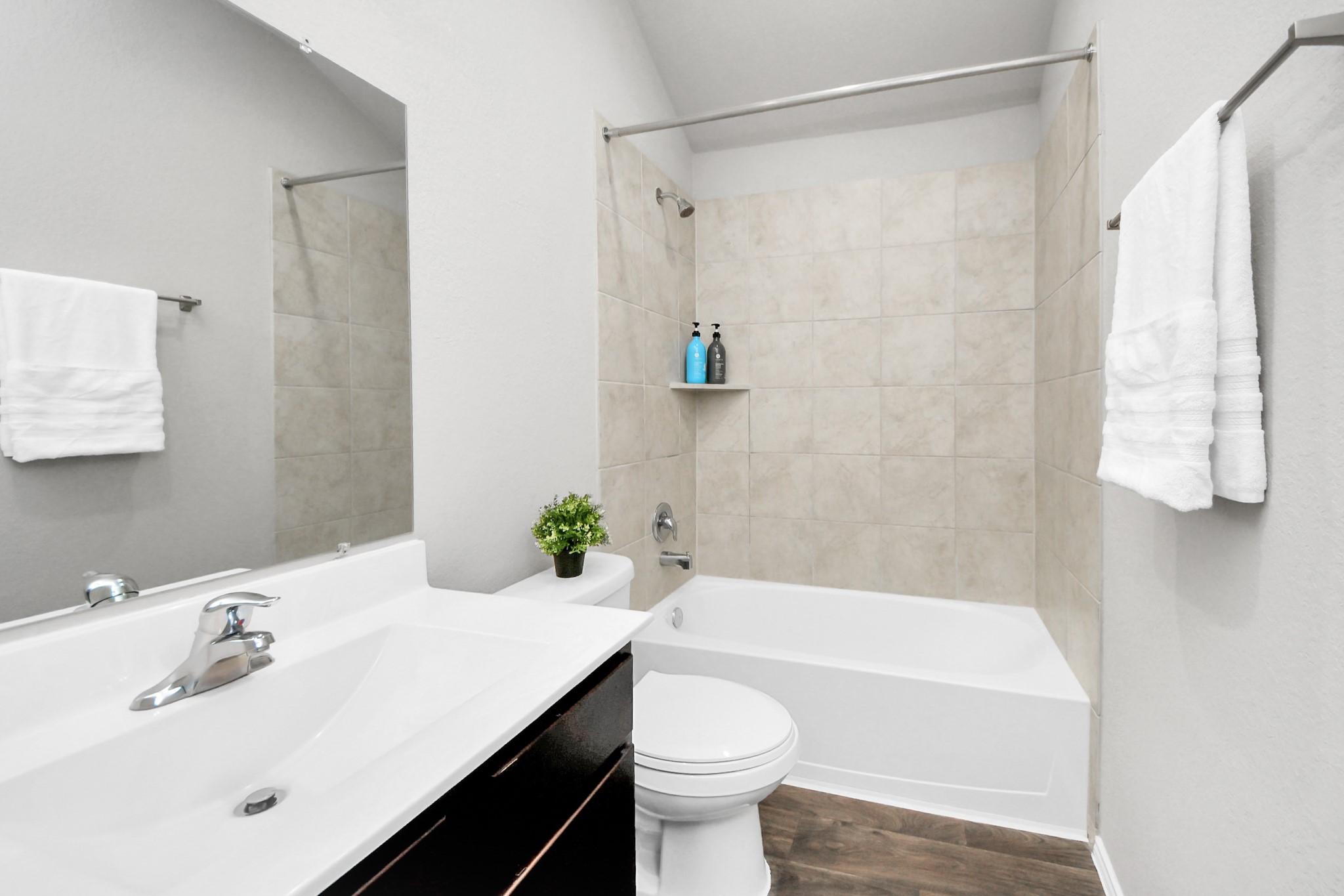 22906 Modica Rift Lane Katy, TX 77449 - Photo 19 of 27 a bathroom with a sink a toilet and shower