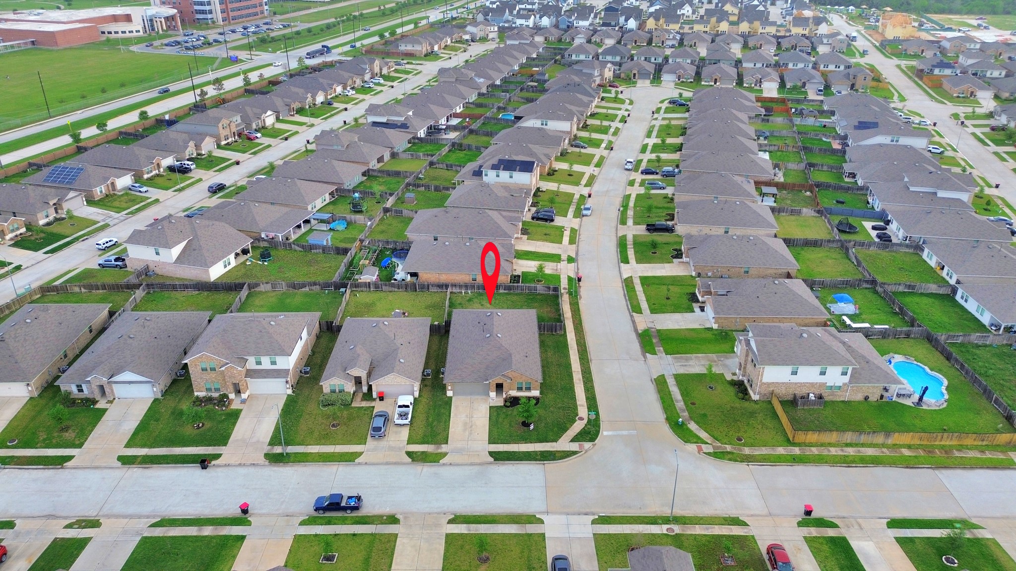 22906 Modica Rift Lane Katy, TX 77449 - Photo 22 of 27 an aerial view of an buildings and street