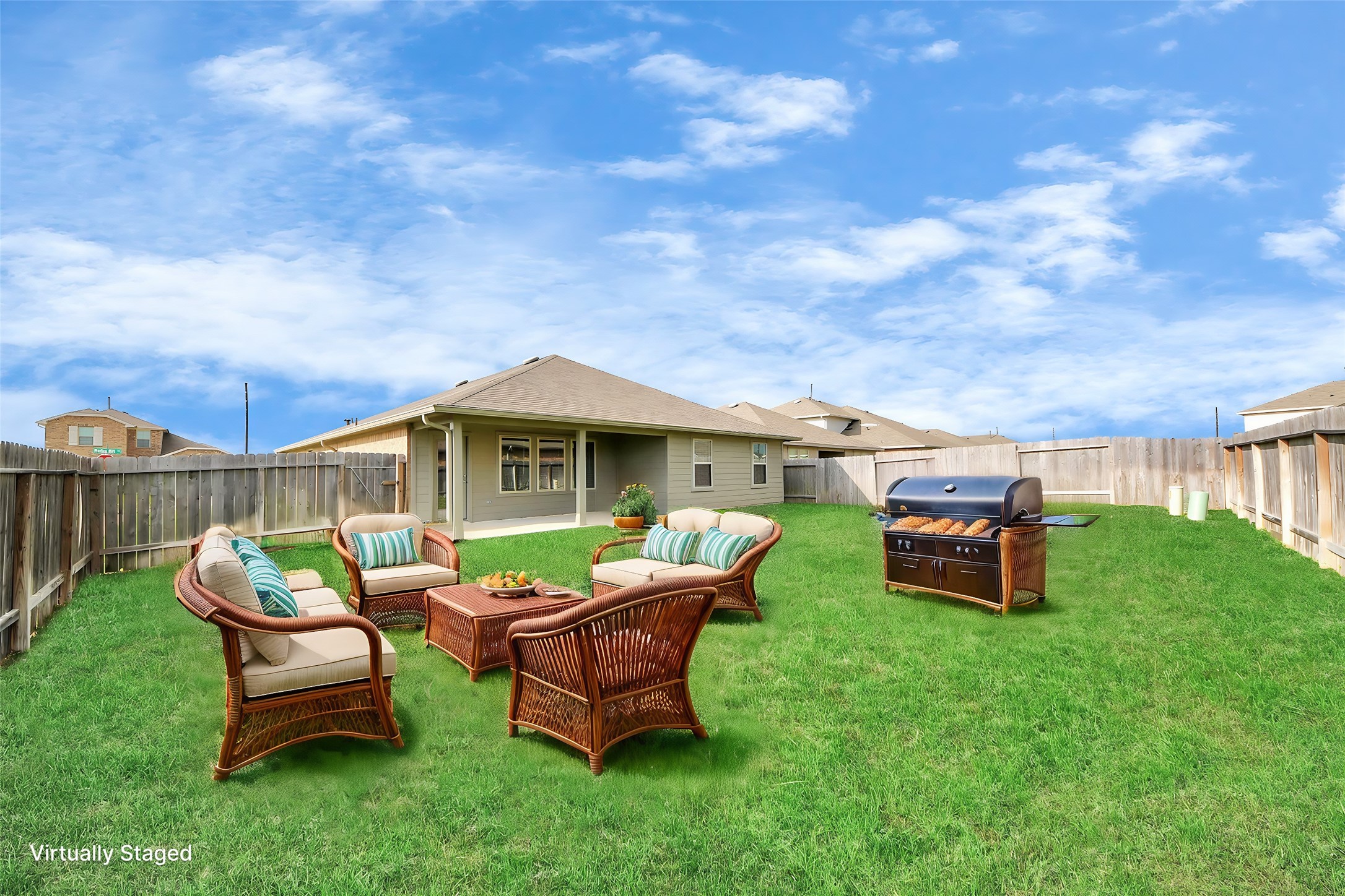 22906 Modica Rift Lane Katy, TX 77449 - Photo 23 of 27 a backyard of a house with table and chairs