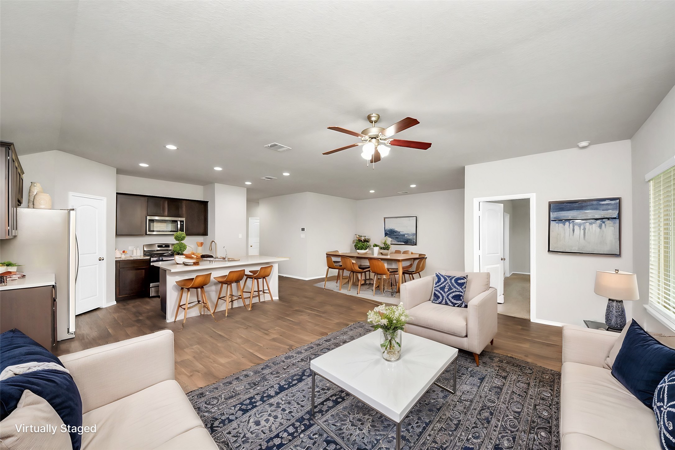 22906 Modica Rift Lane Katy, TX 77449 - Photo 3 of 27 a living room with furniture kitchen view and a table