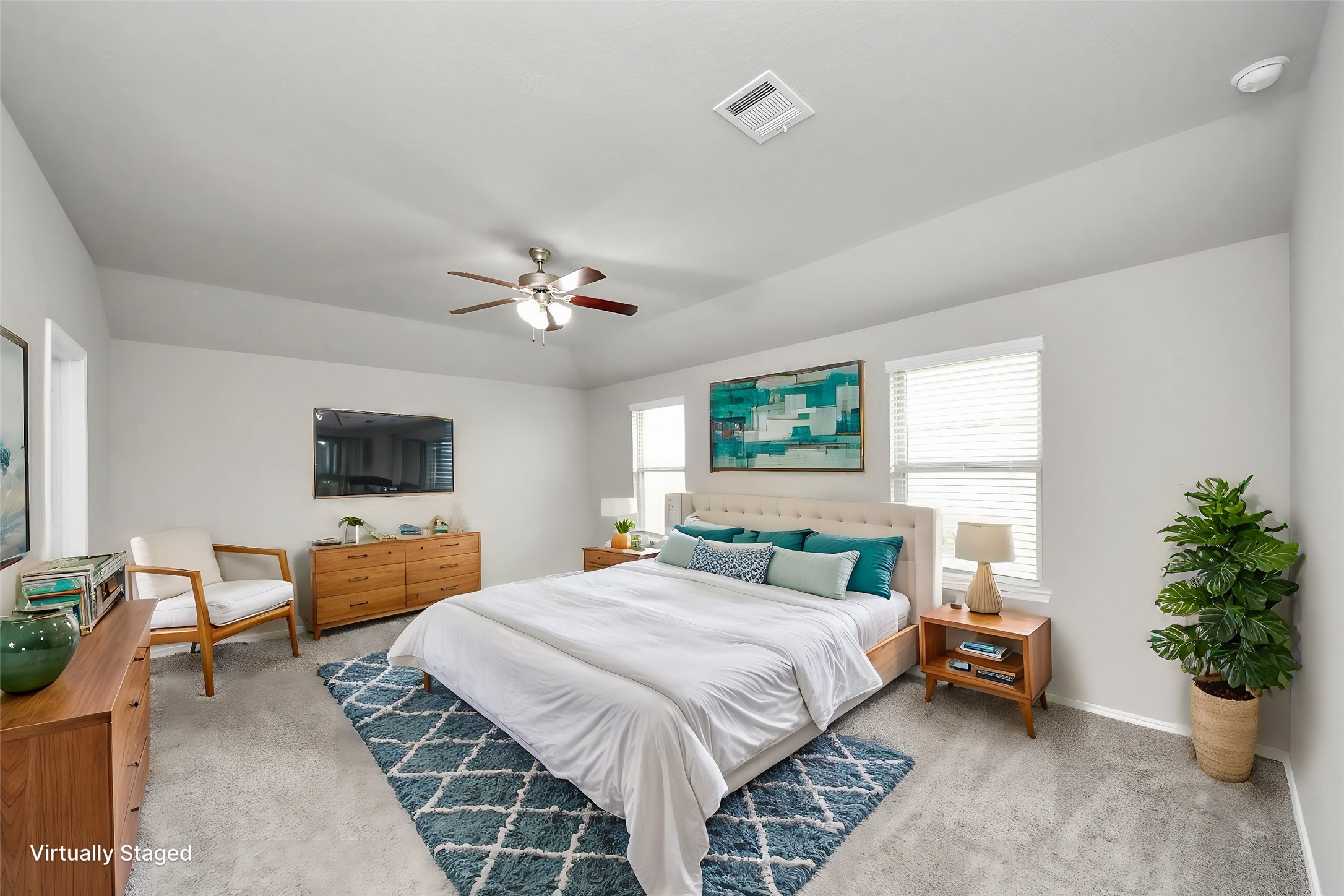 22906 Modica Rift Lane Katy, TX 77449 - Photo 5 of 27 a bedroom with a bed and a couch