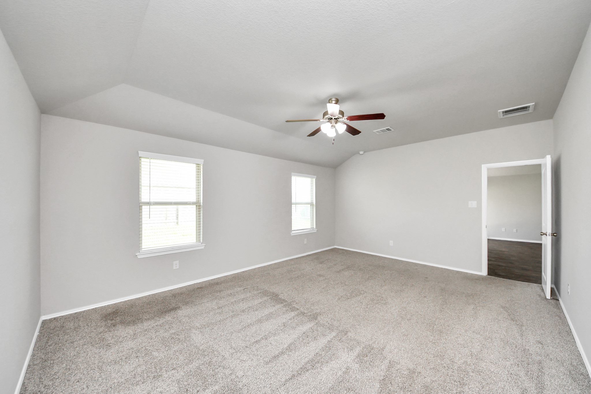 22906 Modica Rift Lane Katy, TX 77449 - Photo 6 of 27 a view of an empty room with a window