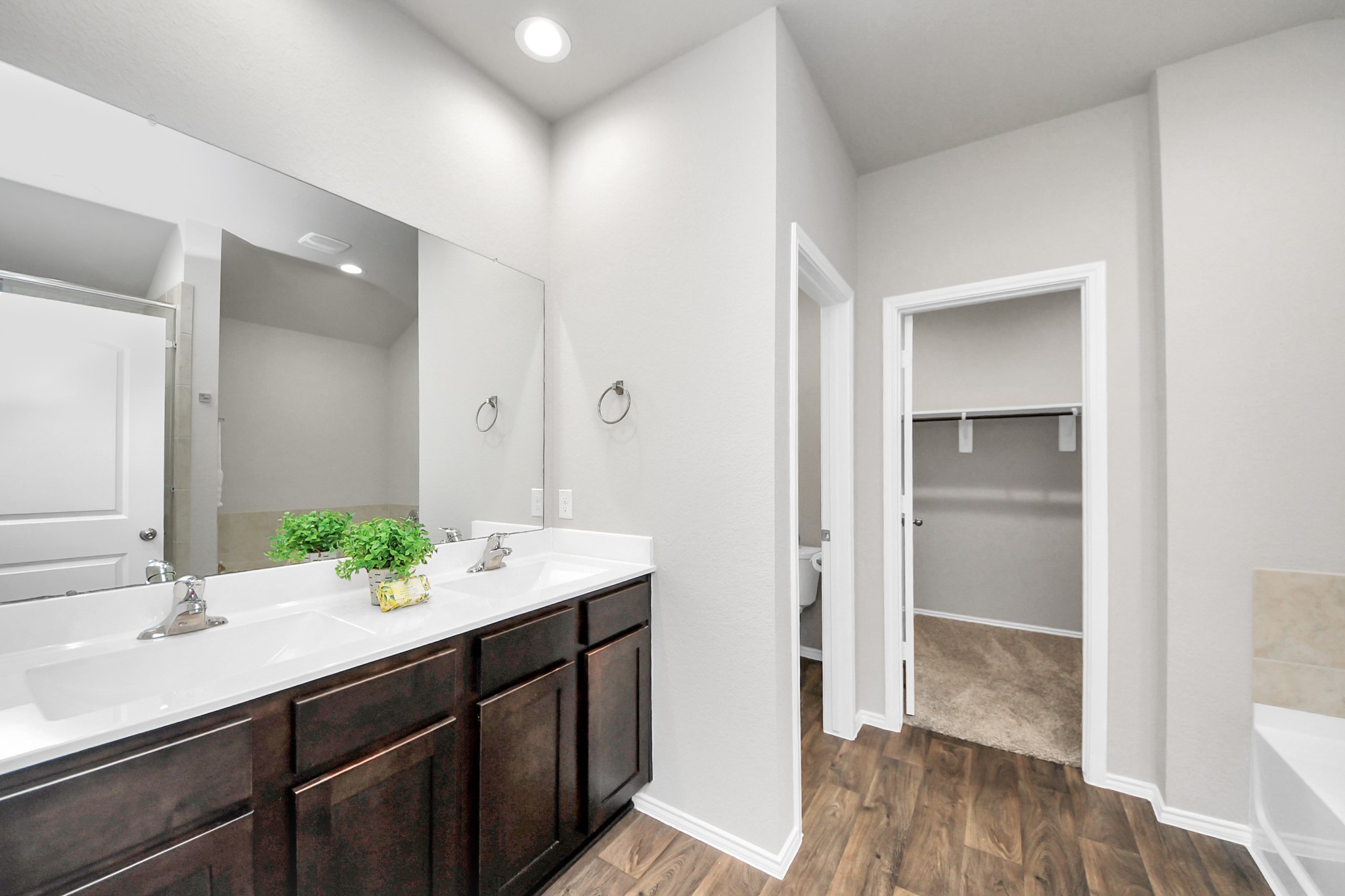 22906 Modica Rift Lane Katy, TX 77449 - Photo 7 of 27 a bathroom with a sink and a mirror