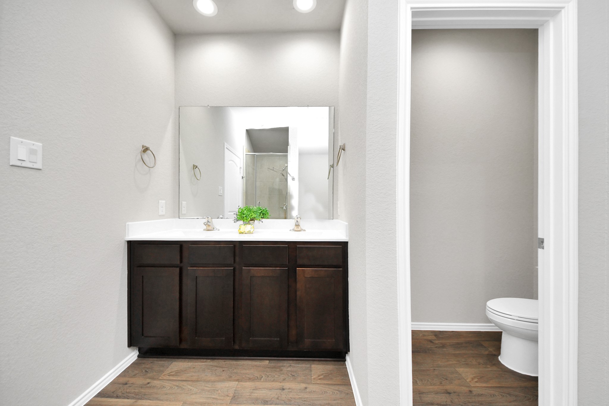 22906 Modica Rift Lane Katy, TX 77449 - Photo 9 of 27 a bathroom with a sink and a toilet