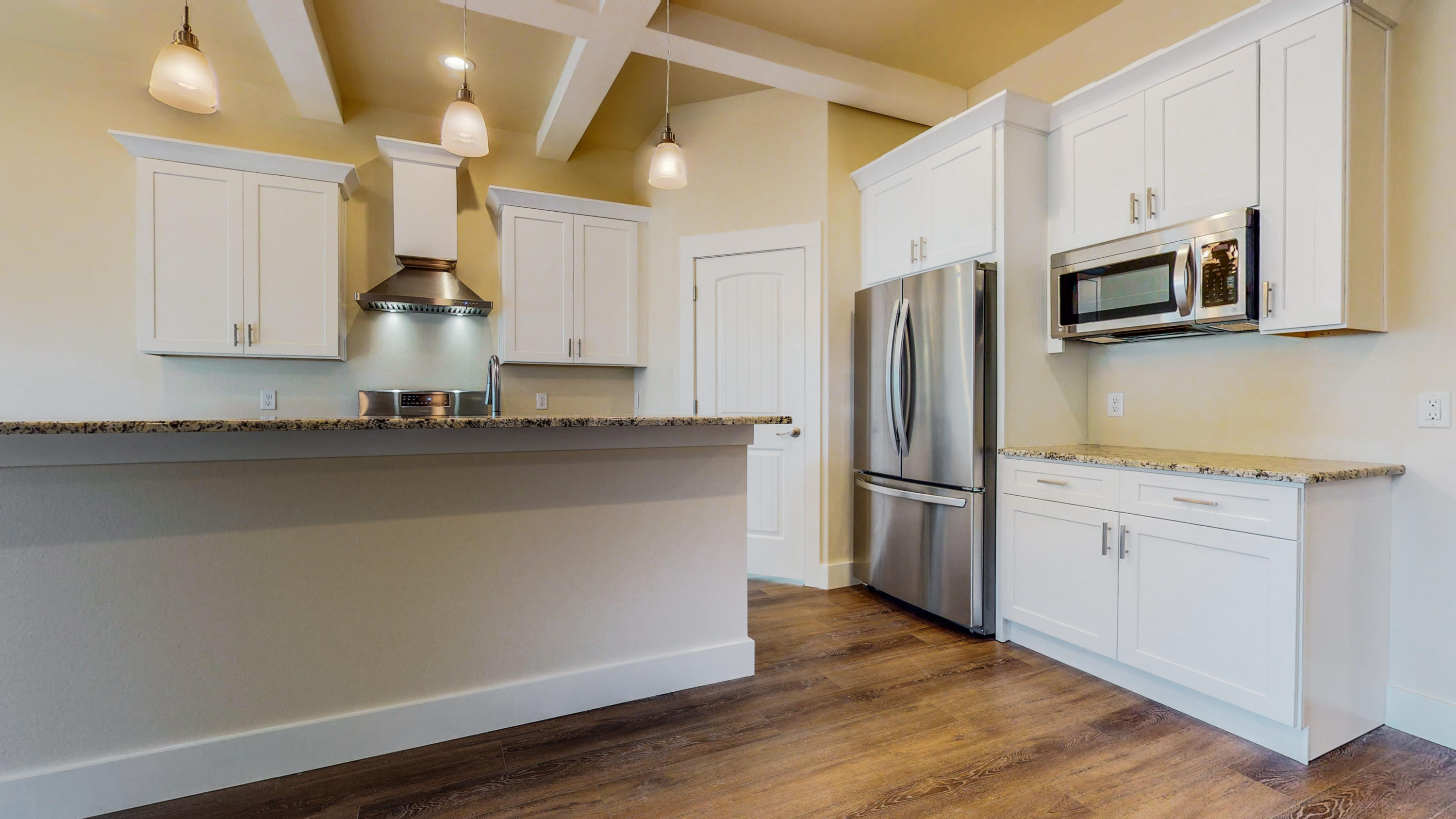 512 Harborview Circle Niceville, FL 32578 - Photo 12 of 42 a kitchen with stainless steel appliances a refrigerator microwave and sink