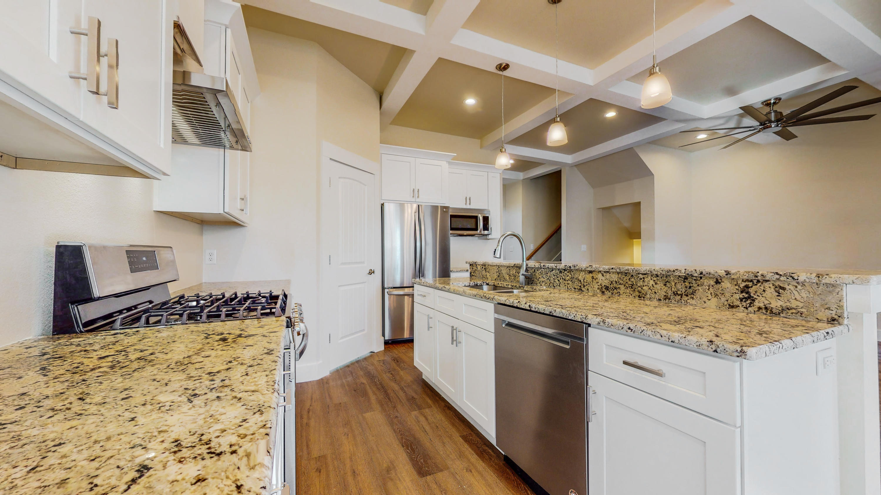512 Harborview Circle Niceville, FL 32578 - Photo 15 of 42 a kitchen with stainless steel appliances granite countertop a stove sink and cabinets