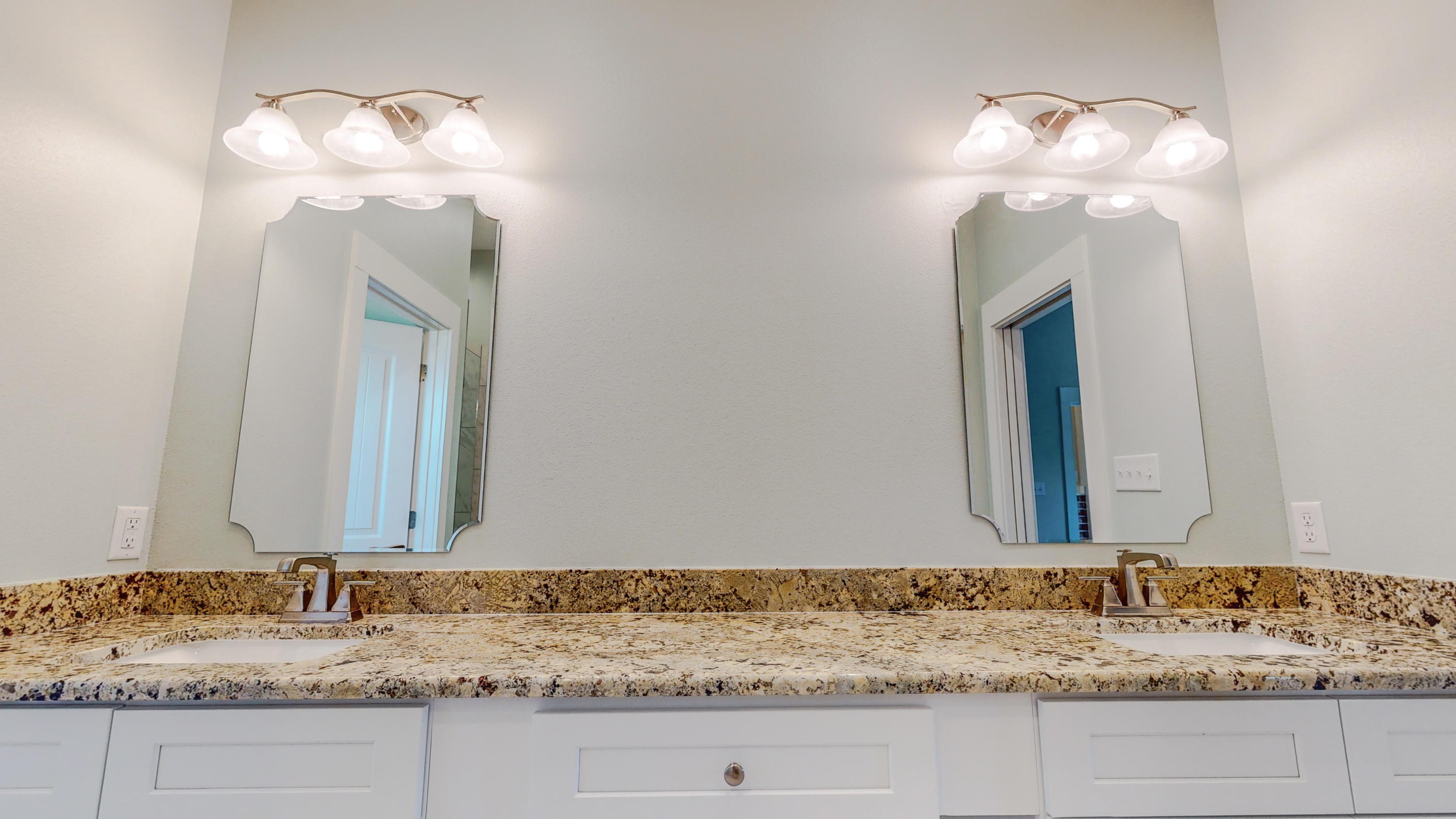 512 Harborview Circle Niceville, FL 32578 - Photo 20 of 42 a bathroom with a sink and a mirror