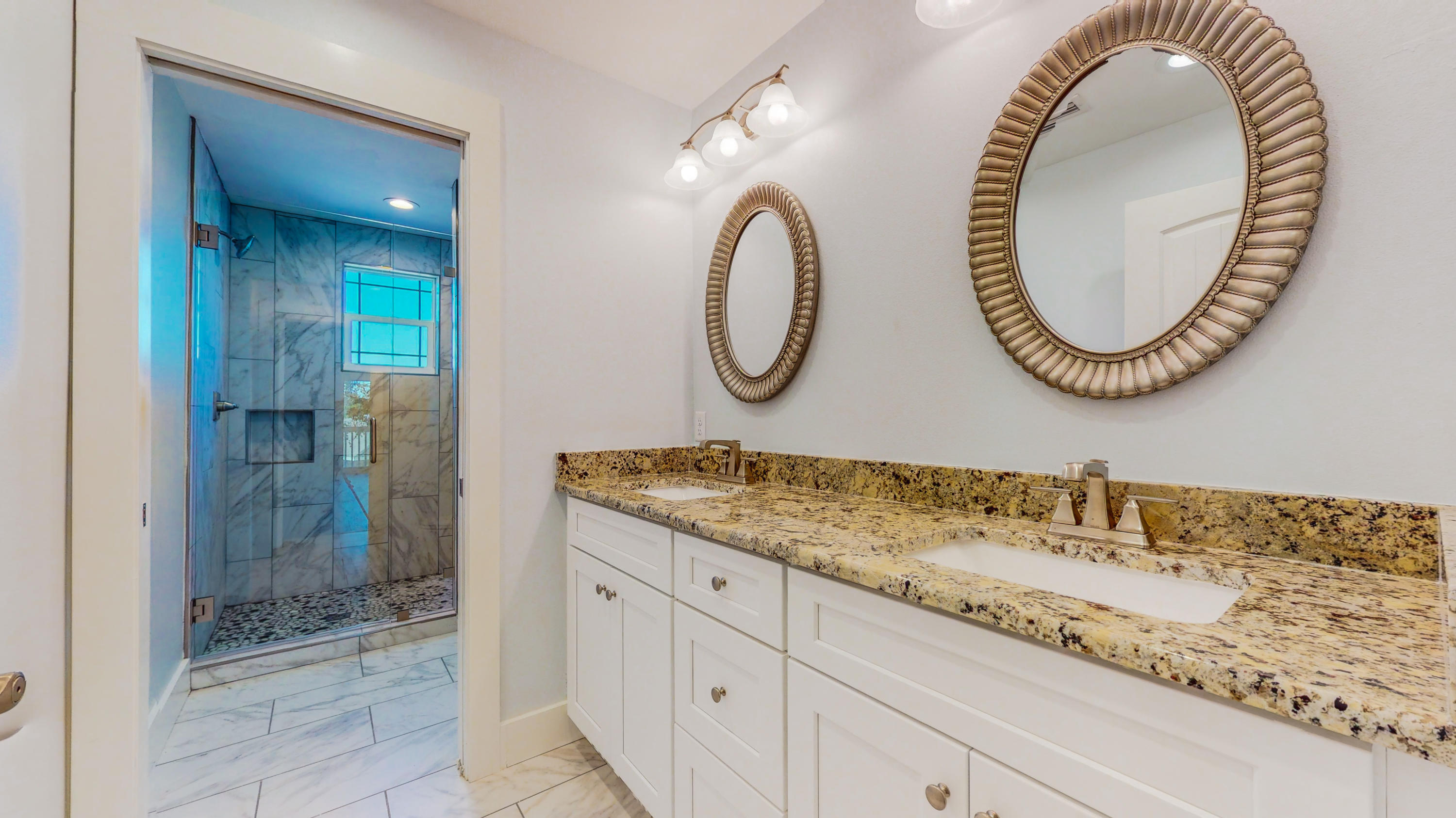 512 Harborview Circle Niceville, FL 32578 - Photo 30 of 42 a bathroom with a sink and a mirror