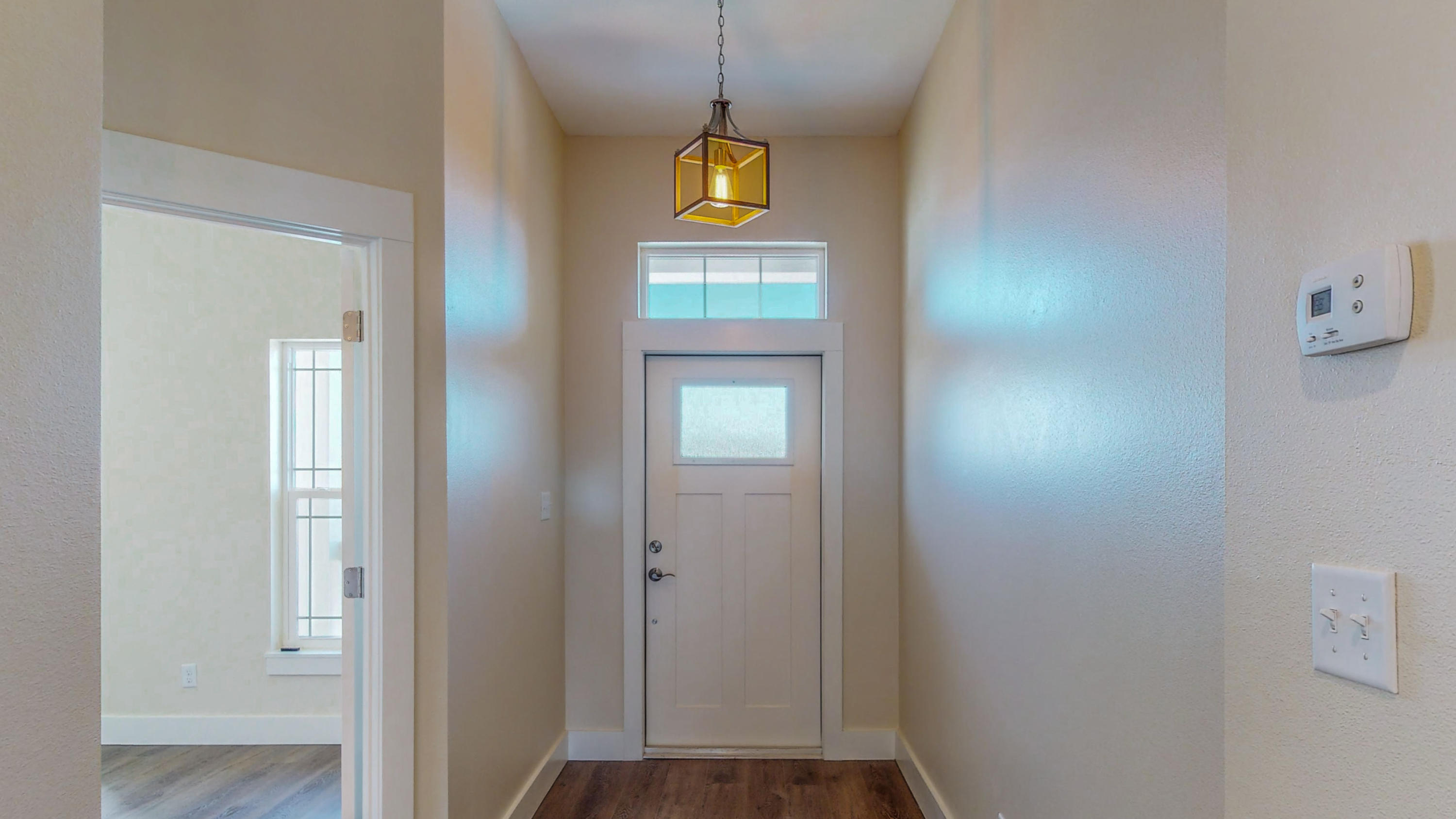 512 Harborview Circle Niceville, FL 32578 - Photo 6 of 42 a view of an entryway with wooden floor