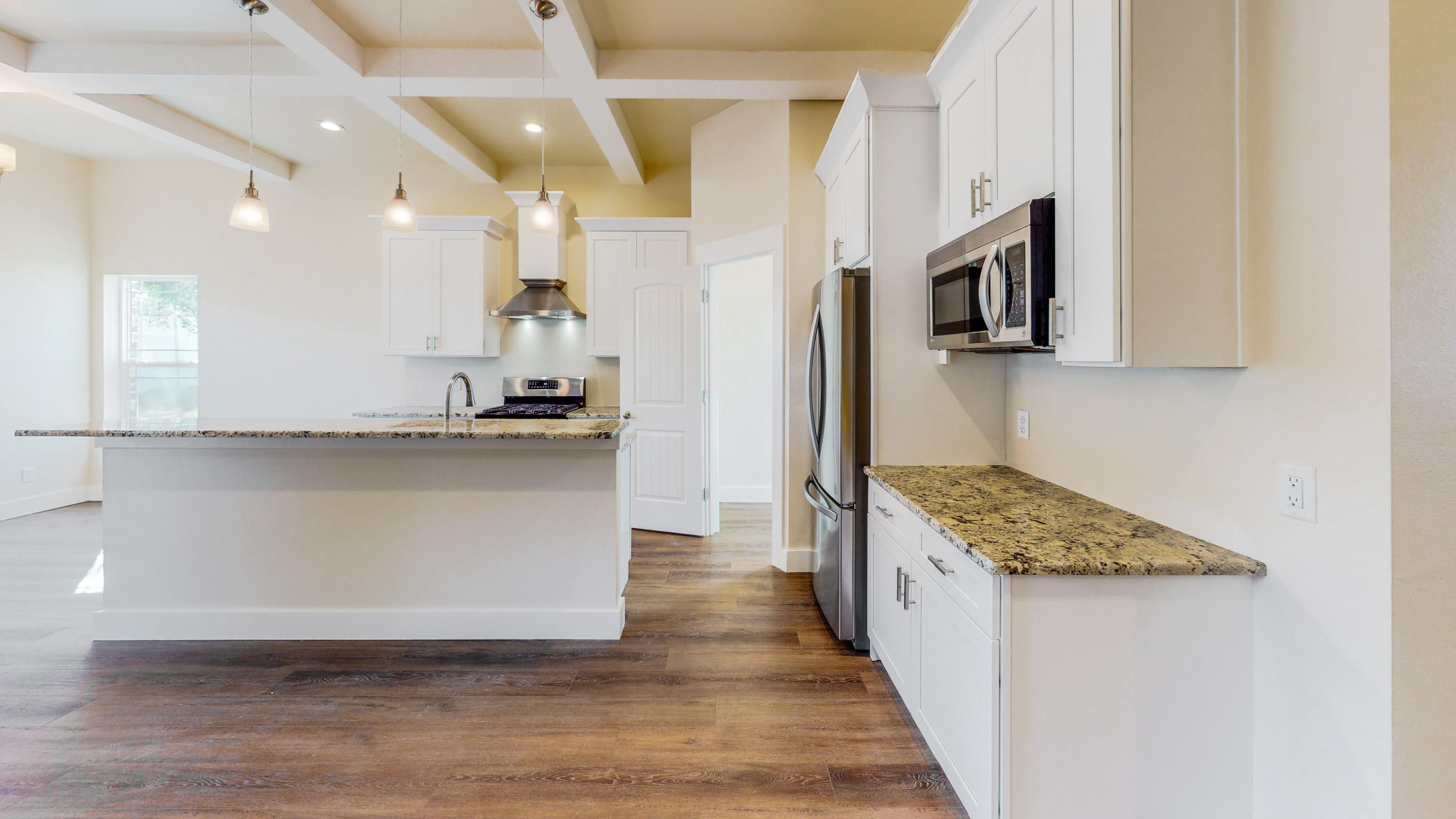 512 Harborview Circle Niceville, FL 32578 - Photo 10 of 42 a kitchen with stainless steel appliances granite countertop a stove a sink and a refrigerator