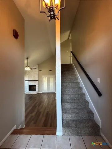 a view of a livingroom with a fireplace