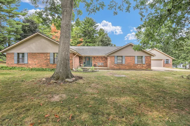 a house view with a garden space