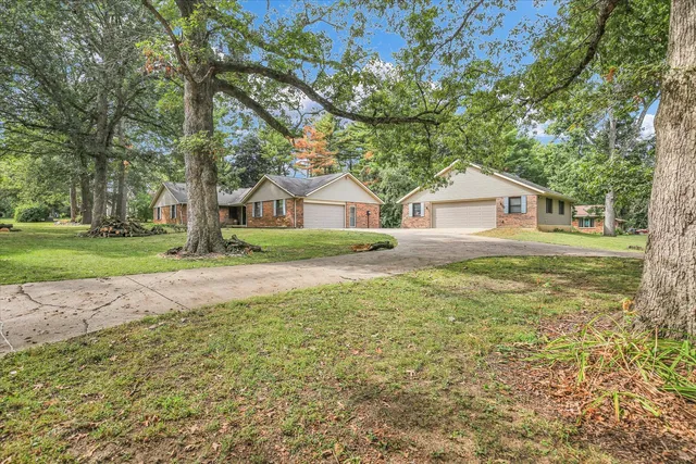 a house view with a garden space