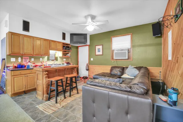 a room with musical instruments and air hockey table