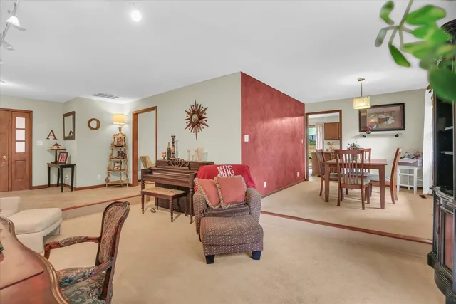 a view of a dining room with furniture window and outside view