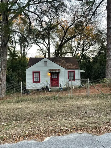 a house view with a backyard space
