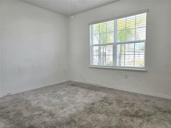 an empty room with a window