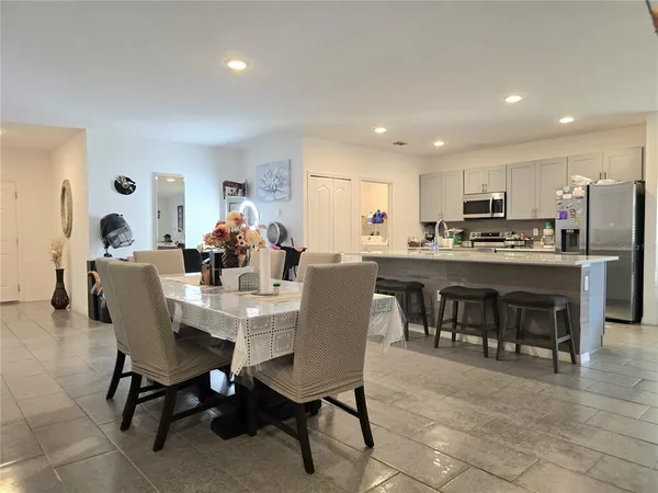 a view of a dining room with furniture