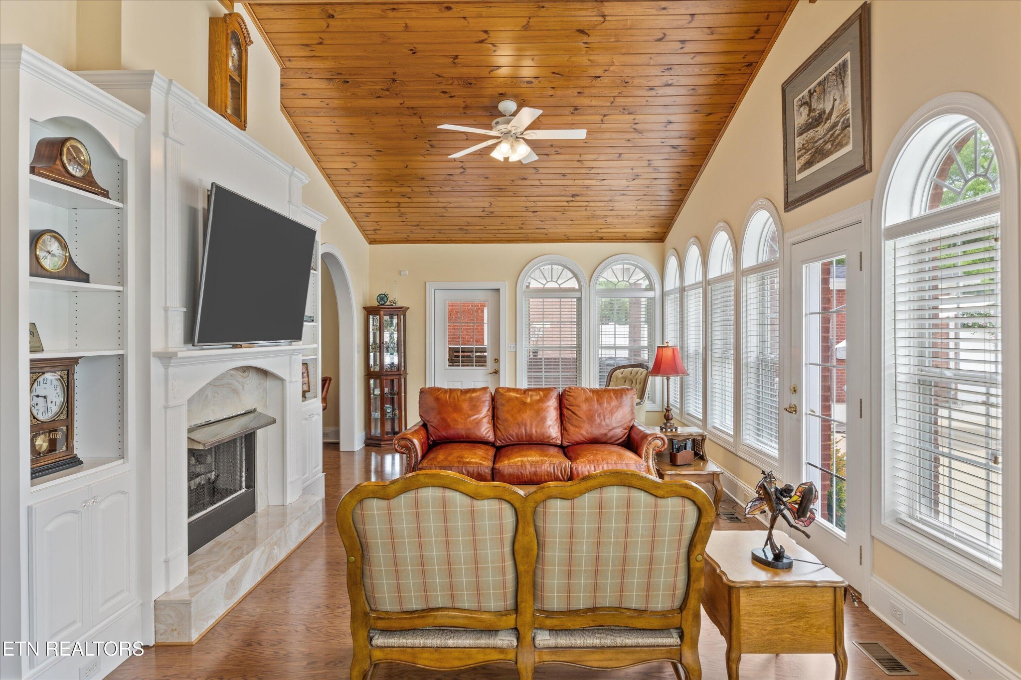 132 David Road Clinton, TN 37716 - Photo 12 of 52 a living room with fireplace furniture and a flat screen tv