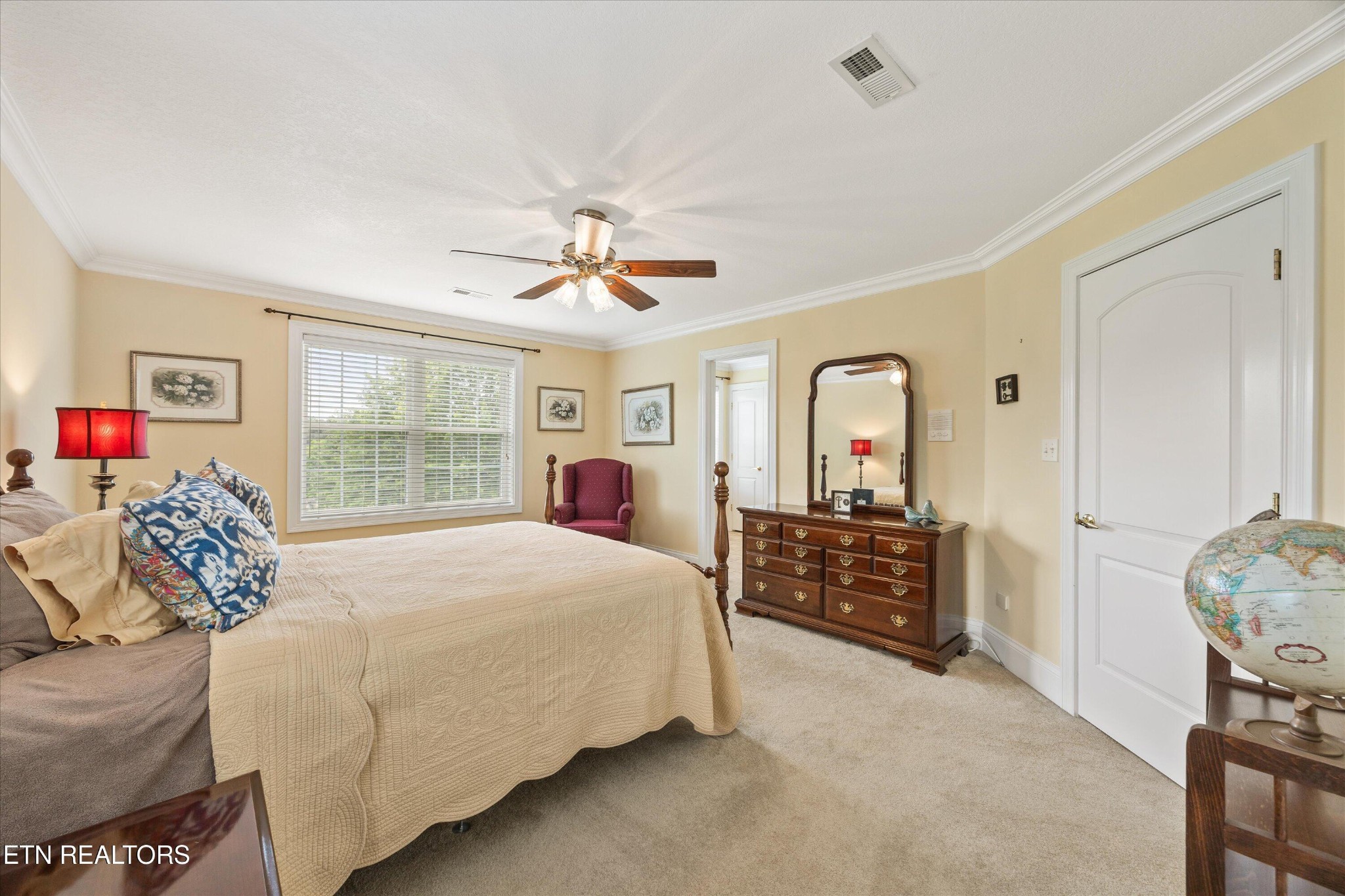 132 David Road Clinton, TN 37716 - Photo 31 of 52 a bedroom with a large bed and a window