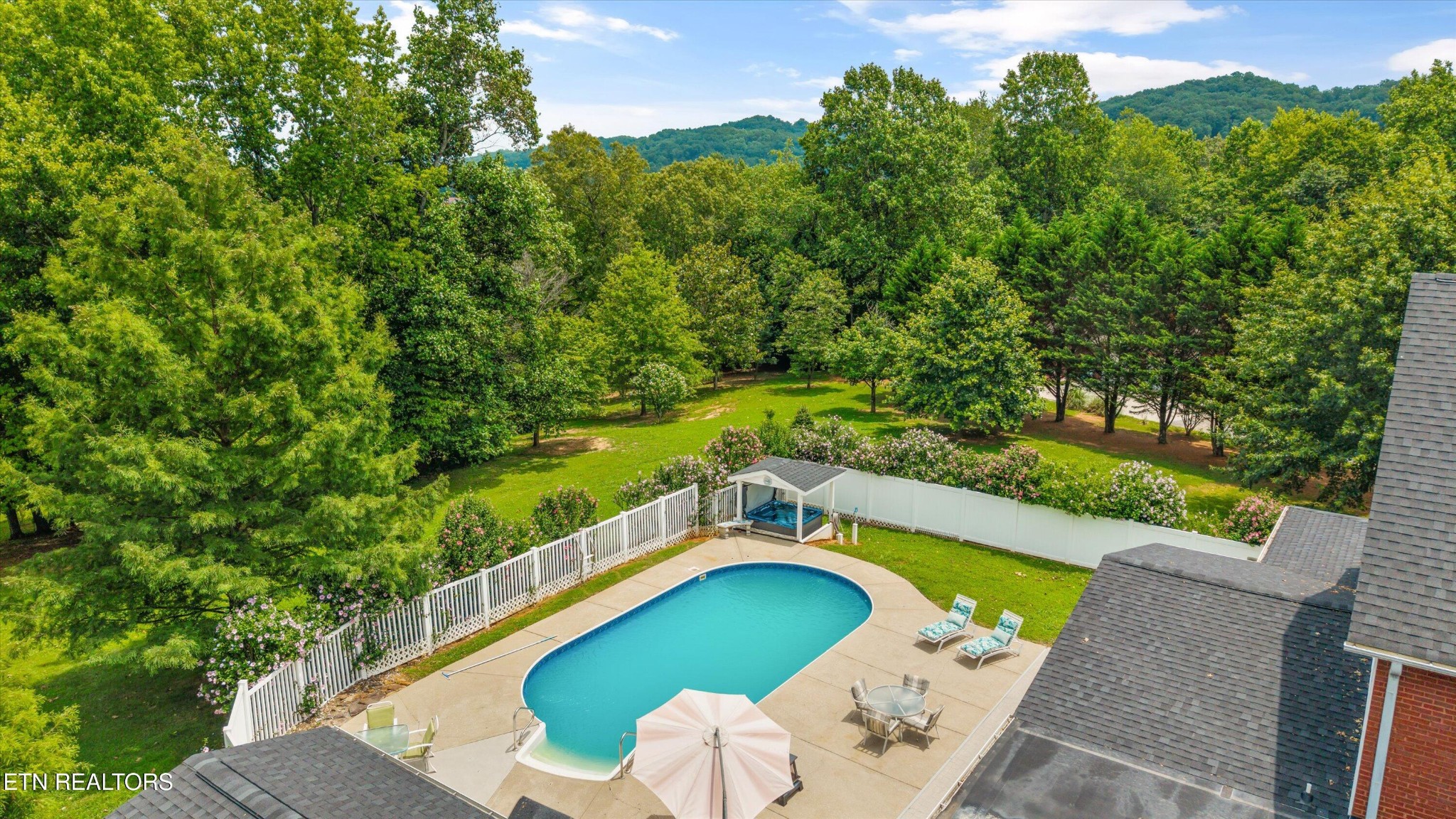 132 David Road Clinton, TN 37716 - Photo 37 of 52 a view of a swimming pool with a yard