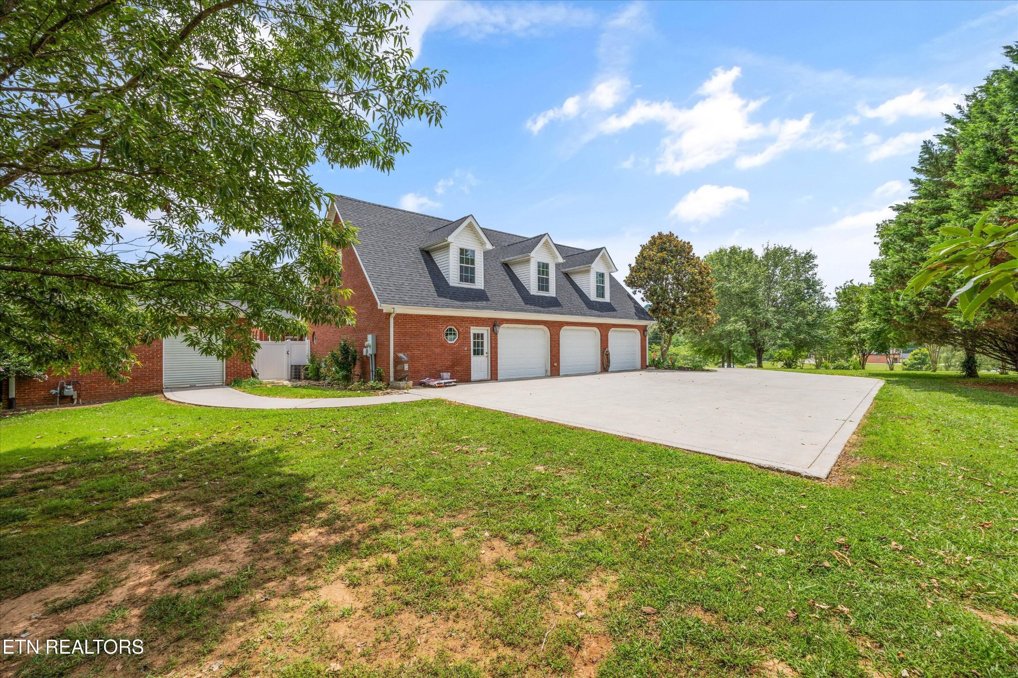 132 David Road Clinton, TN 37716 - Photo 40 of 52 a view of a house with a yard