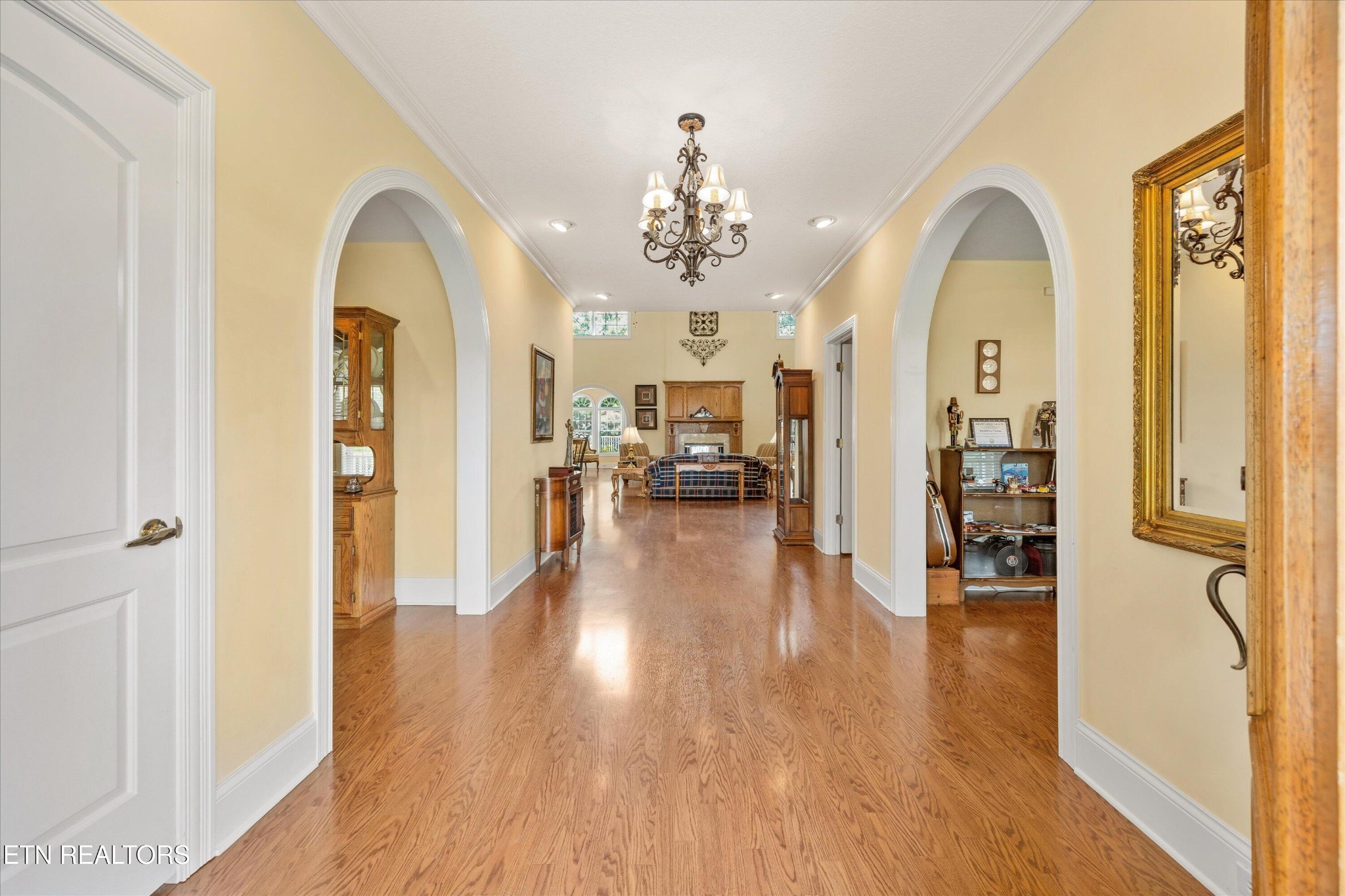 132 David Road Clinton, TN 37716 - Photo 9 of 52 a view of a hallway with wooden floor windows and a livingroom