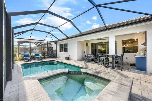 a view of a living room and dining room