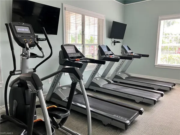 a view of a room with gym equipment