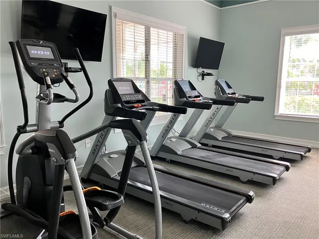 a view of a room with gym equipment