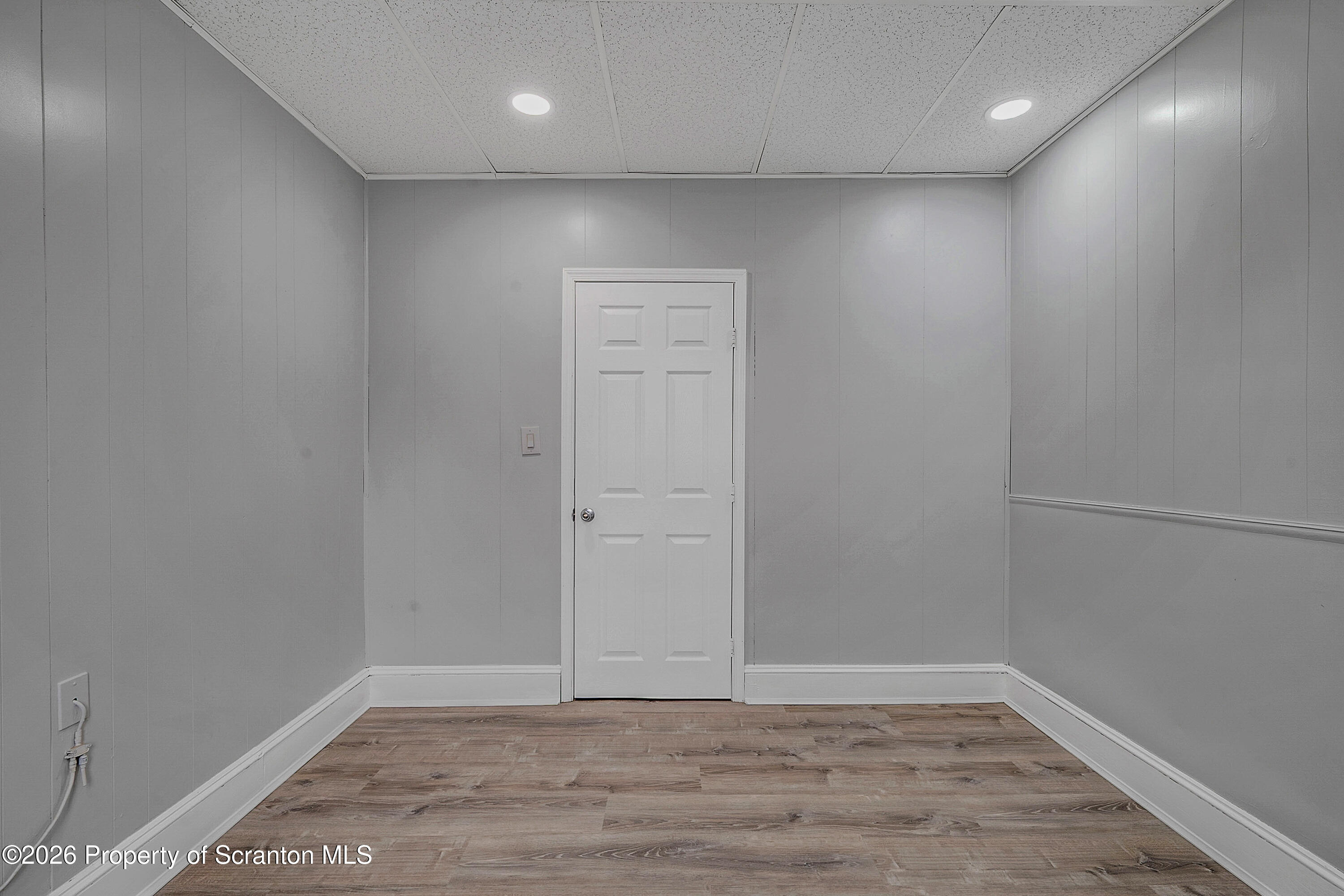6 Green Ridge Street, Unit 2 Scranton, PA 18509 - Photo 13 of 20 a view of an empty room with wooden floor