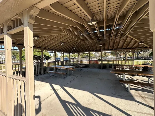 a view of a swimming pool with a porch