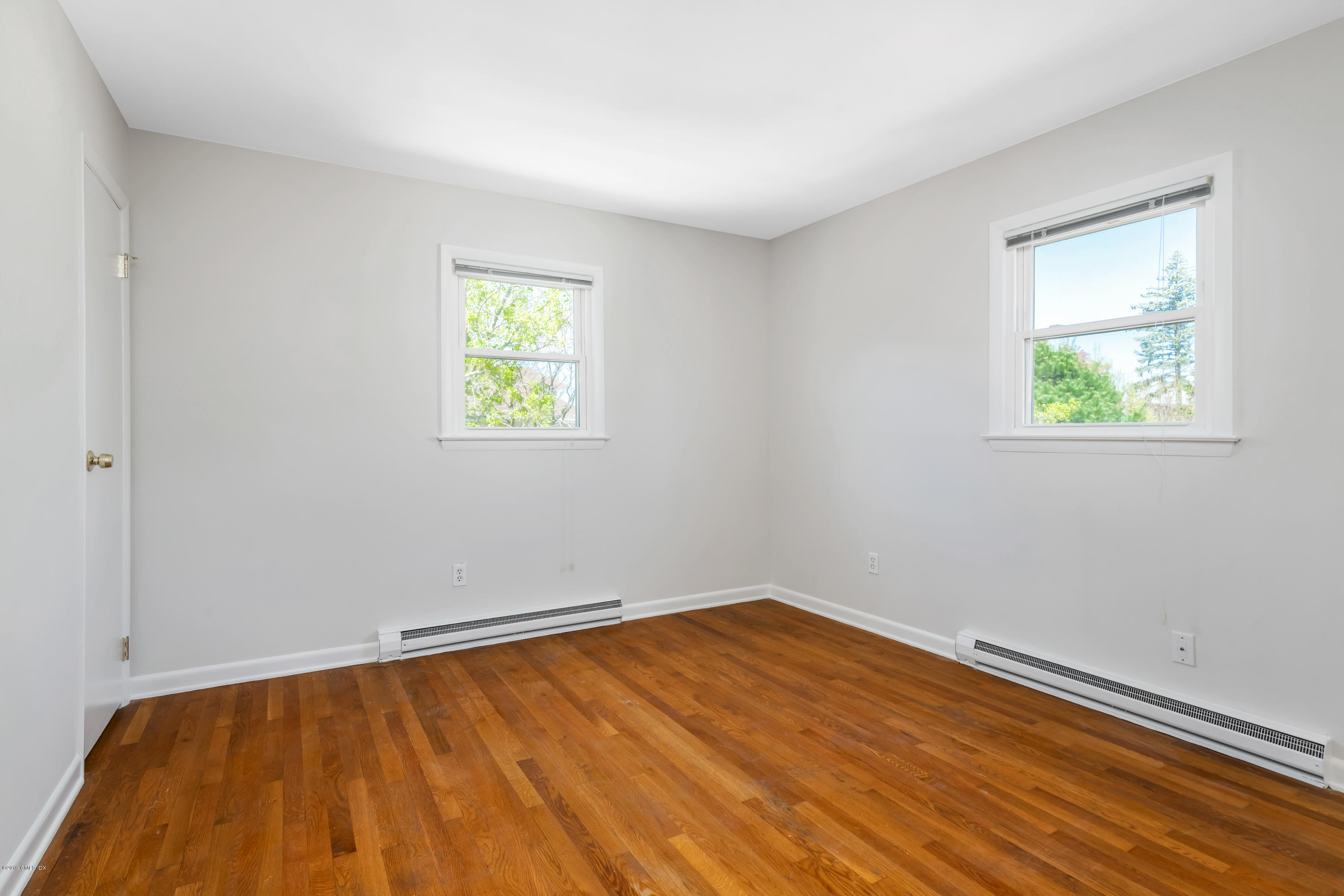 10 Oxer Place Greenwich, CT 06830 - Photo 14 of 22 an empty room with a window