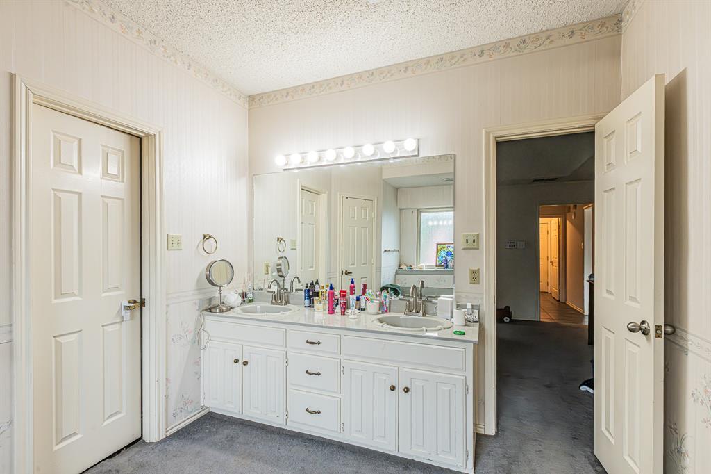 3309 Timber View Circle Bedford, TX 76021 - Photo 26 of 38 a bathroom with a double vanity sink mirror and double