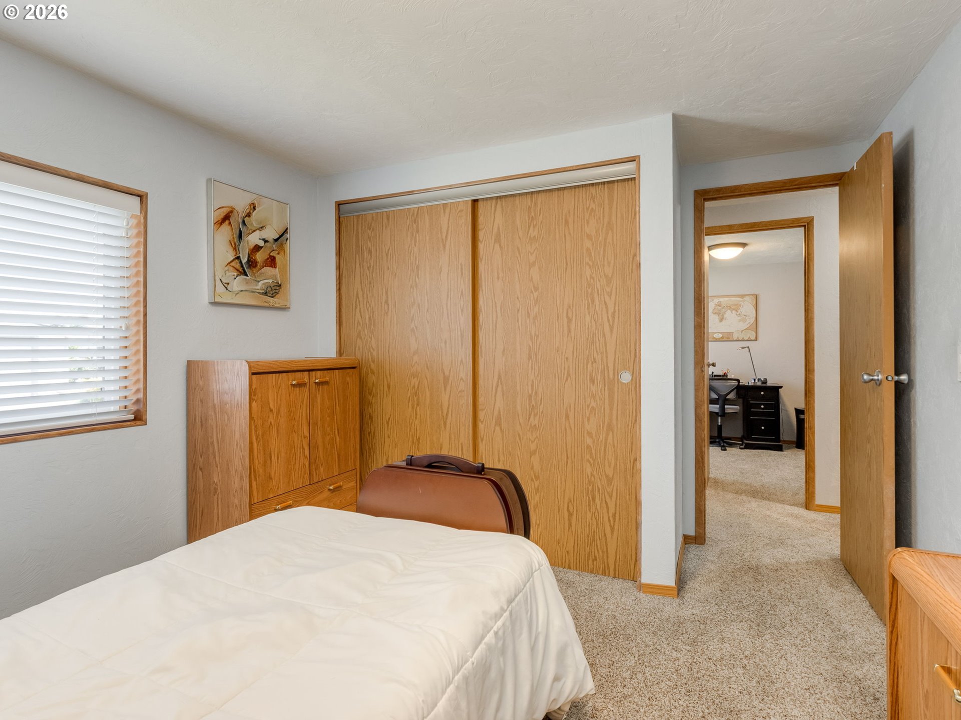 4730 Auburn Road Northeast, Unit 125 Salem, OR 97301 - Photo 17 of 36 a bedroom with a bed and a window