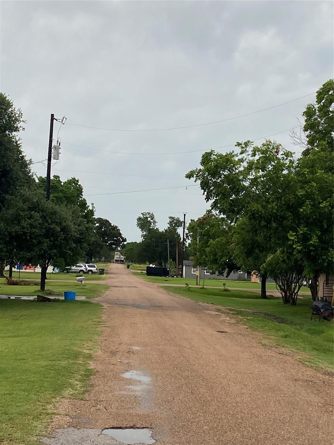 406 Fordtrant Ellinger, TX 78938 - Photo 12 of 17 a view of a water with large trees