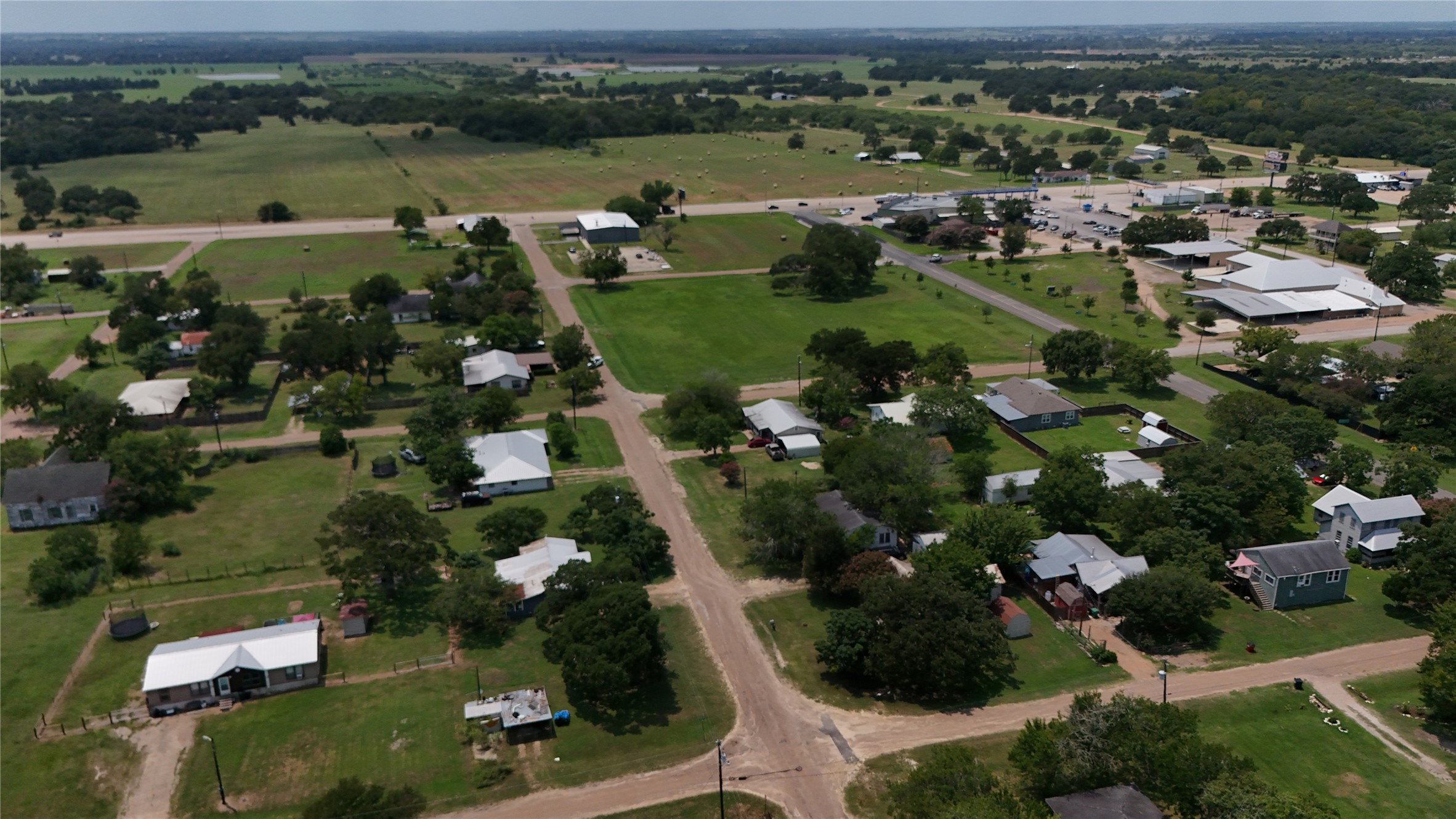 406 Fordtrant Ellinger, TX 78938 - Photo 17 of 17 an aerial view of a houses with outdoor space and lake view