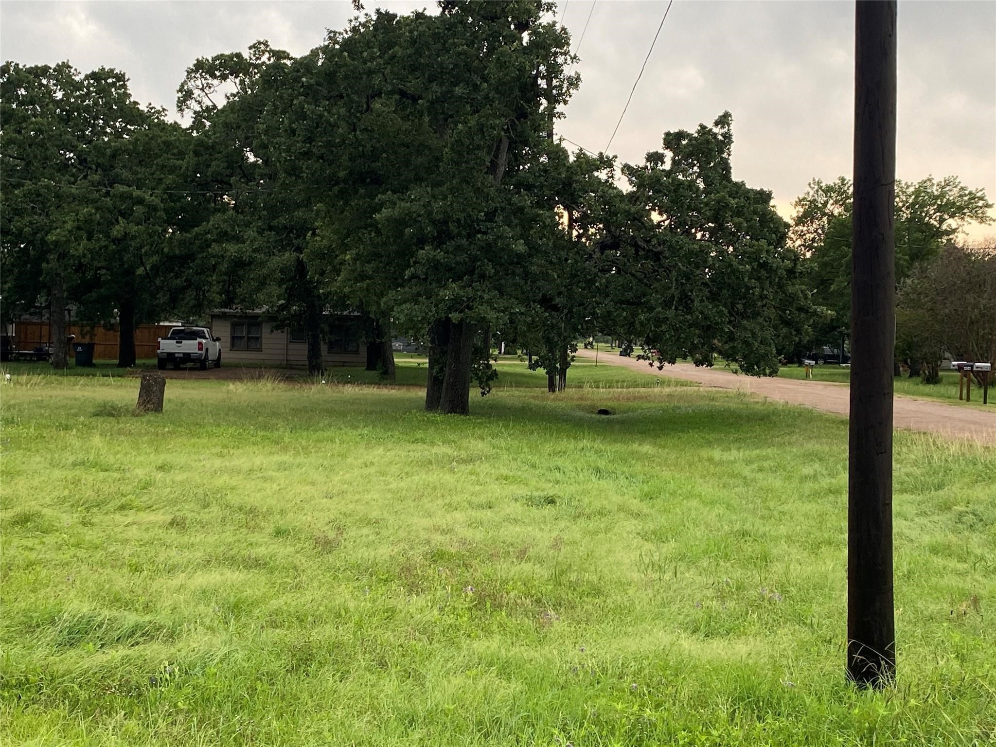406 Fordtrant Ellinger, TX 78938 - Photo 3 of 17 a view of swimming pool with a yard