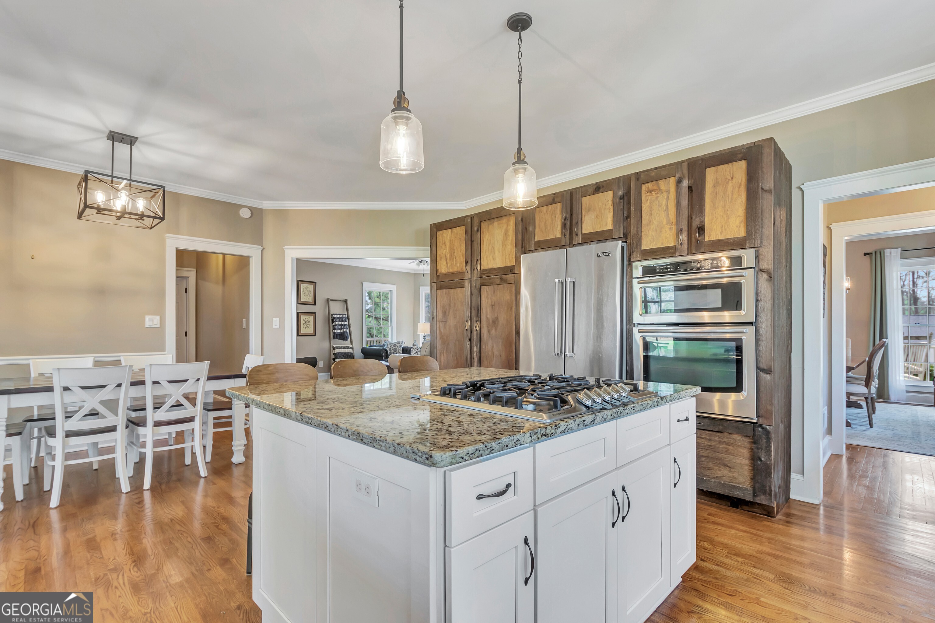 388 Swanson Road Tyrone, GA 30290 - Photo 22 of 62 a kitchen with a counter top space appliances and cabinets
