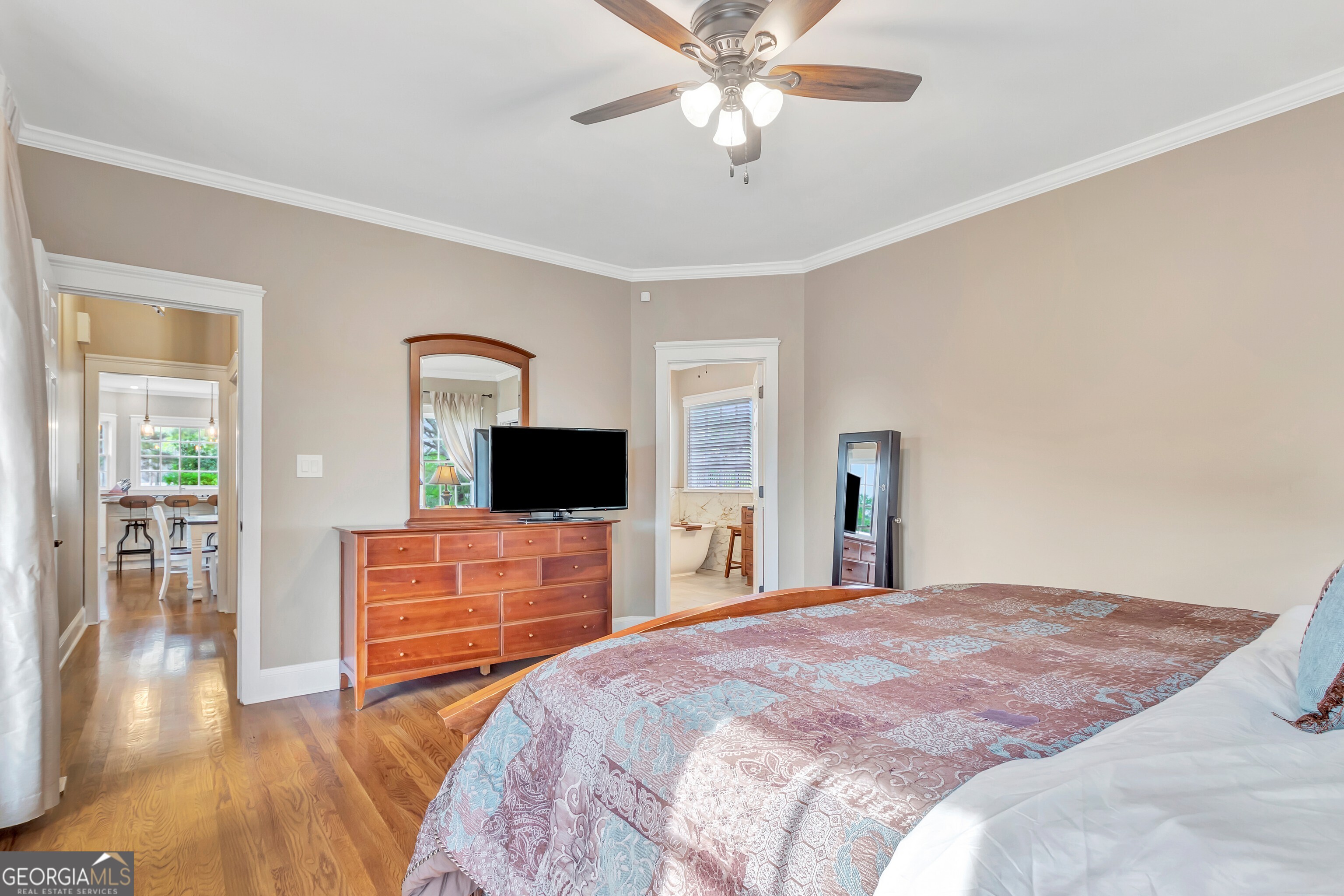 388 Swanson Road Tyrone, GA 30290 - Photo 26 of 62 a bedroom with a bed and a flat screen tv