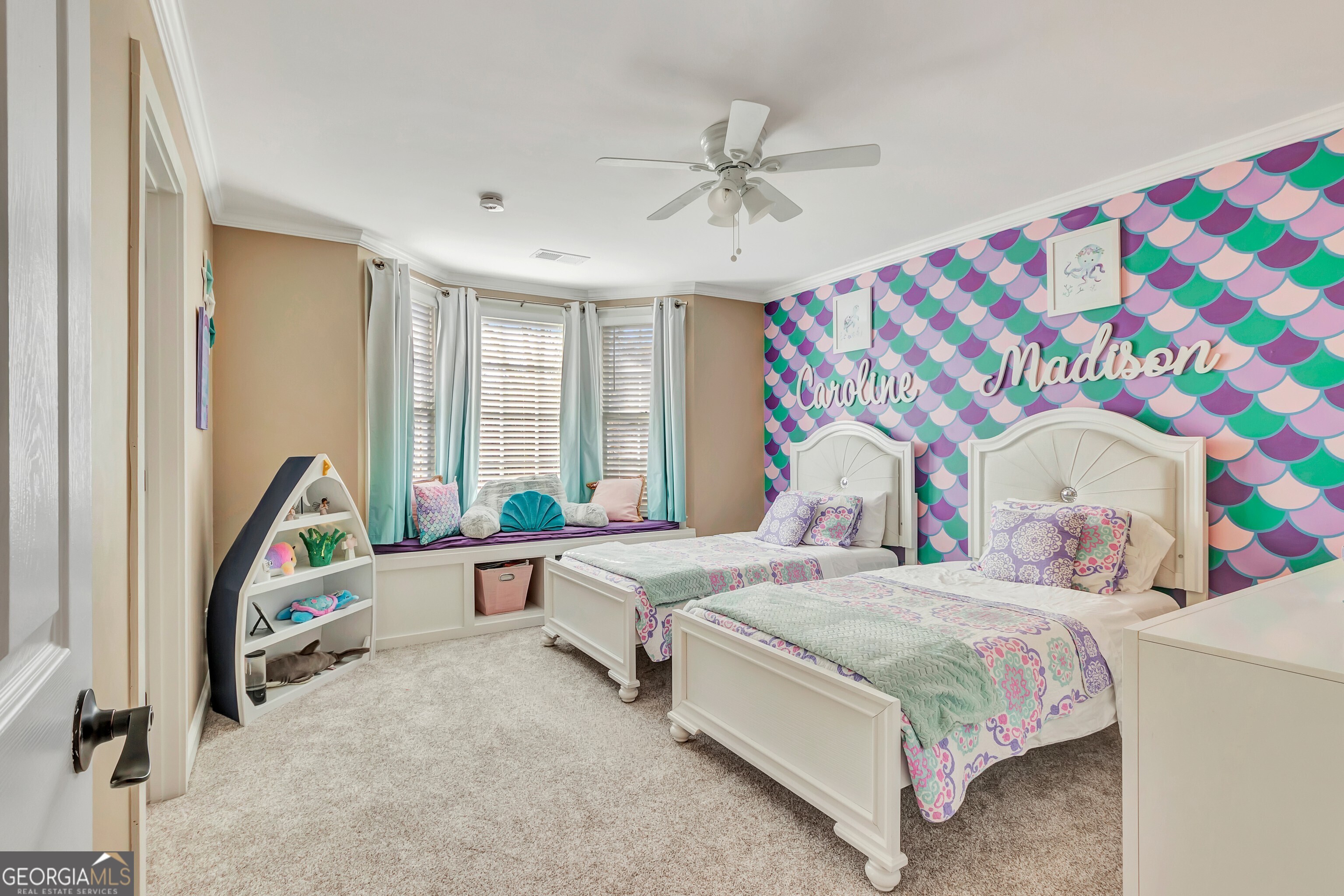 388 Swanson Road Tyrone, GA 30290 - Photo 36 of 62 a bedroom with a bed and a chandelier