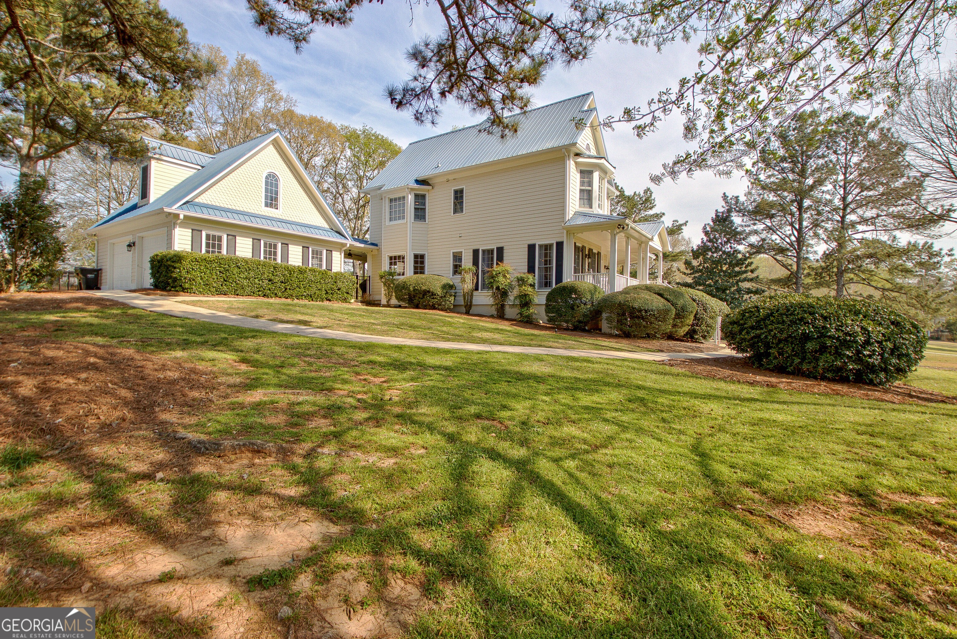 388 Swanson Road Tyrone, GA 30290 - Photo 49 of 62 a view of a house with a yard