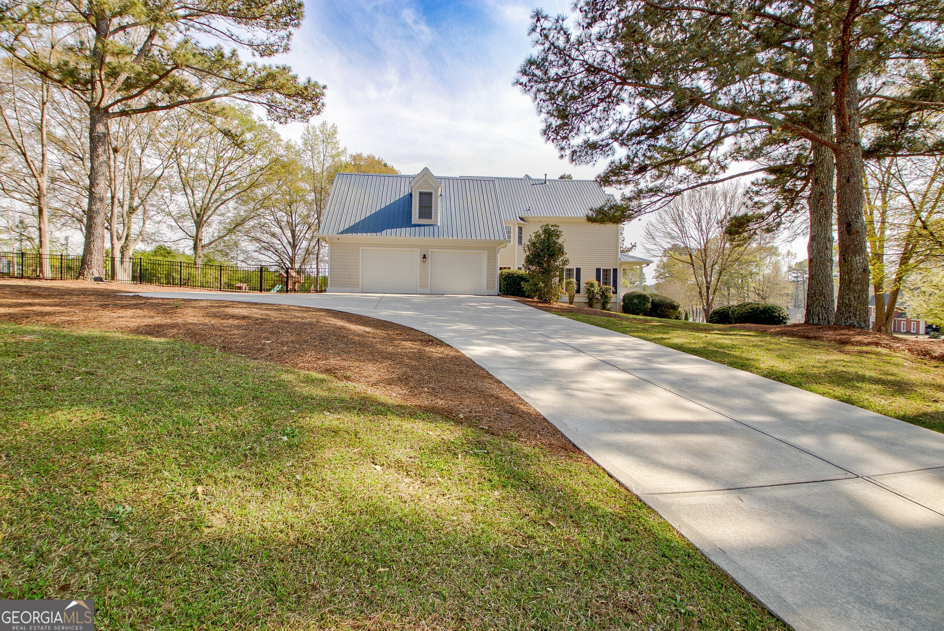 388 Swanson Road Tyrone, GA 30290 - Photo 52 of 62 a front view of a house with a yard and trees