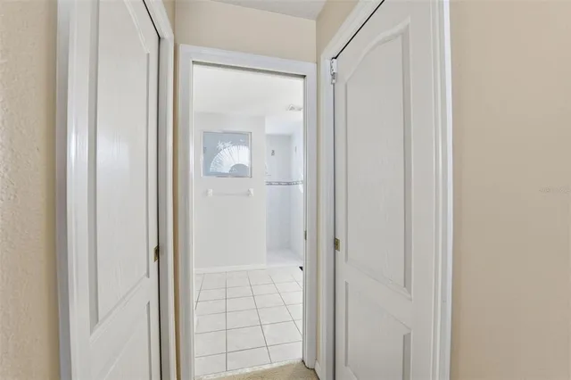 a bathroom with a shower curtain and a curtain